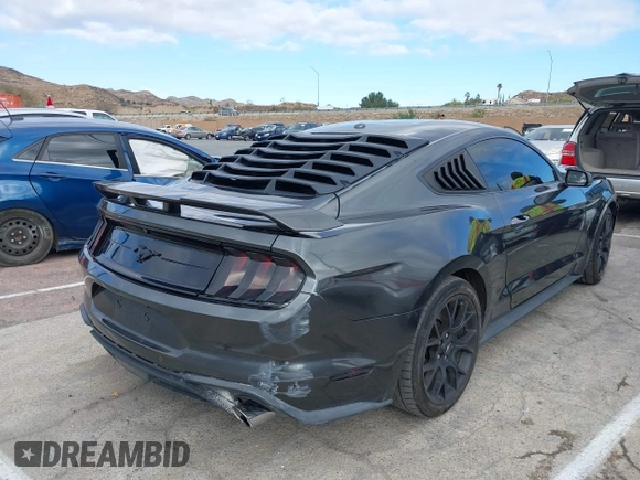 2018 Ford Mustang EcoBoost z VIN 1FA6P8THXJ5154523, wystawiony jako IAAI lot #41523923 z przebiegiem 94 330 mil mil oraz . Historia ofert i sprzedaży dostępna na DreamBid. Obrazek 4.