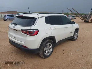 2019 Jeep Compass Latitude with VIN 3C4NJCBB3KT802907, listed as a IAAI auction lot 42595157 with 103,993 mi miles and . Bid and sale history available at DreamBid. Image 4.