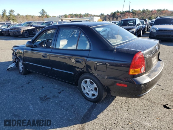 2005 Hyundai Accent GLS z VIN KMHCG45C15U662362, wystawiony jako Copart lot #80574774 z przebiegiem 122 898 mil mil oraz Szkoda całkowita • Salvage title. Historia ofert i sprzedaży dostępna na DreamBid. Obrazek 2.