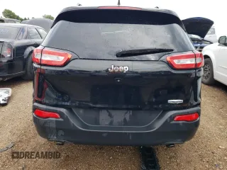 2014 Jeep Cherokee Latitude with VIN 1C4PJLCSXEW320764, listed as a Copart auction lot 83899244 with 140,904 mi miles and Salvage Title. Bid and sale history available at carsss.com. Image 6.