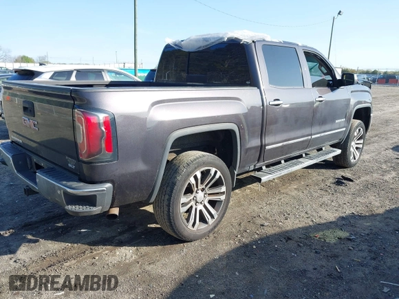2016 GMC Sierra 1500 SLT with VIN 3GTU2NEC5GG291712, listed as a IAAI auction lot 41924266 with 135,005 mi miles and . Bid and sale history available at DreamBid. Image 4.