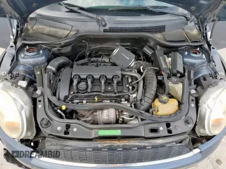 2010 MINI Hardtop S with VIN WMWMF7C51ATZ69061, listed as a Copart auction lot 60837465 with 102,506 mi miles and Salvage title. Bid and sale history available at DreamBid. Image 11.