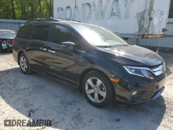 2019 Honda Odyssey EX-L with VIN 5FNRL6H73KB103467, listed as a Copart auction lot 52604005 with 101,892 mi miles and Salvage Title. Bid and sale history available at DreamBid. Image 4.