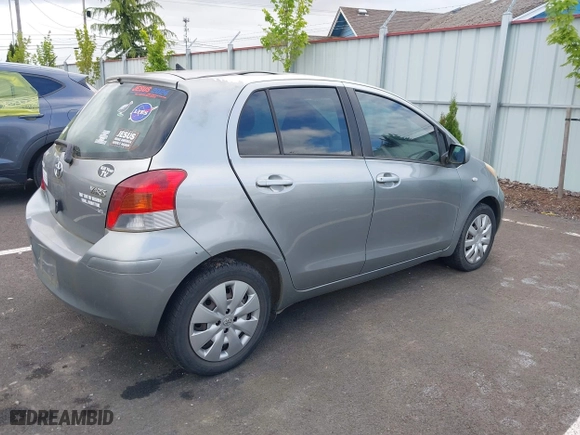 2009 Toyota Yaris with VIN JTDKT903295237216, listed as a IAAI auction lot 42087676 with 158,341 mi miles. Bid and sale history available at carsss.com. Image 4.