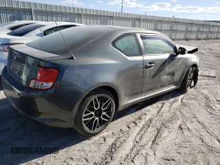 2012 Scion tC z VIN JTKJF5C71C3040608, wystawiony jako Copart lot #53704565 z przebiegiem Nie podano mil oraz Szkoda całkowita • Salvage title. Historia ofert i sprzedaży dostępna na DreamBid. Obrazek 3.