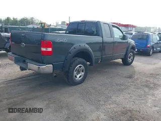 2005 Ford F-150 XLT with VIN 1FTPX14555NA51705, listed as a IAAI auction lot 42098365 with 162,409 mi miles. Bid and sale history available at carsss.com. Image 4.