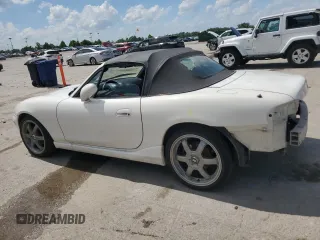 2000 Mazda MX-5 Miata with VIN JM1NB3531Y0152594, listed as a Copart auction lot 57460195 with 78,139 mi miles and Salvage title. Bid and sale history available at DreamBid. Image 2.