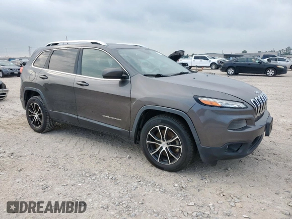 2017 Jeep Cherokee Latitude with VIN 1C4PJLCS9HW586913, listed as a Copart auction lot 57302965 with 141,254 mi miles and Clean title. Bid and sale history available at DreamBid. Image 4.