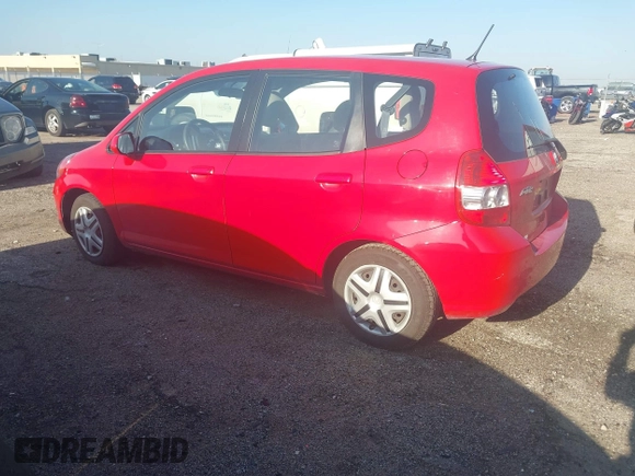 2007 Honda Fit with VIN JHMGD38497S064174, listed as a IAAI auction lot 42038262 with 74,580 mi miles. Bid and sale history available at carsss.com. Image 3.