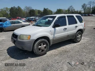 2002 Ford Escape XLS Choice with VIN 1FMYU01132KC59244, listed as a Copart auction lot 52849735 with 54,367 mi miles and Salvage title. Bid and sale history available at DreamBid. Image 1.