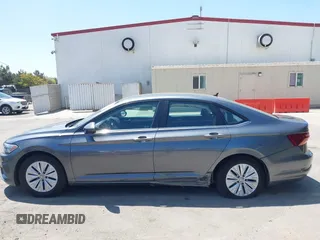 2019 Volkswagen Jetta S z VIN 3VWC57BUXKM074708, wystawiony jako IAAI lot #42151448 z przebiegiem 189 430 mil mil oraz . Historia ofert i sprzedaży dostępna na DreamBid. Obrazek 14.