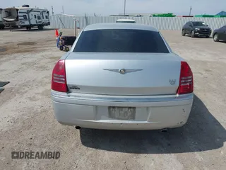 2005 Chrysler 300 with VIN 2C3JA63H05H693522, listed as a IAAI auction lot 41847279 with 162,037 mi miles. Bid and sale history available at carsss.com. Image 16.