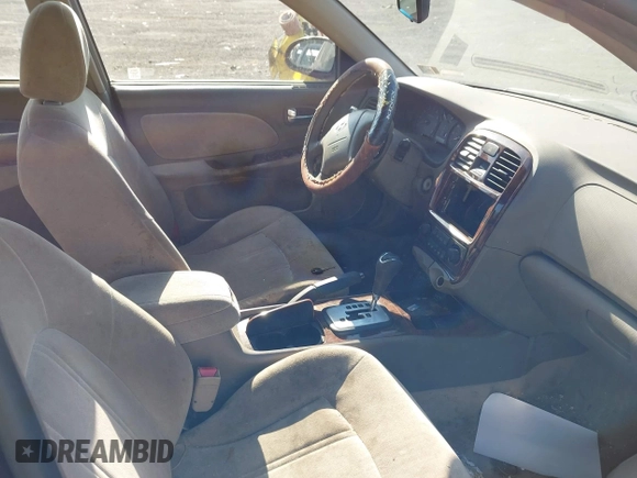 2002 Hyundai Sonata GLS with VIN KMHWF35H42A512538, listed as a IAAI auction lot 42000170 with 157,172 mi miles. Bid and sale history available at carsss.com. Image 5.
