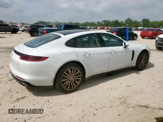 2017 Porsche Panamera с VIN WP0AA2A71HL102183, выставлен на аукционе Copart как лот 57901885 с пробегом 51 605 миль миль и Списание • Salvage title. История ставок и продаж доступна на DreamBid. Изображение 3.