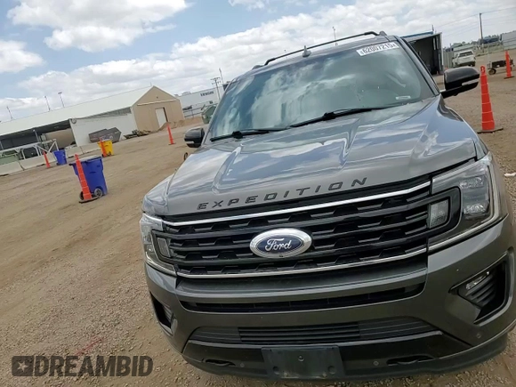 2021 Ford Expedition Limited z VIN 1FMJU2AT1MEA16614, wystawiony jako Copart lot #62007215 z przebiegiem 32 995 mil mil oraz Szkoda całkowita • Salvage title. Historia ofert i sprzedaży dostępna na DreamBid. Obrazek 14.