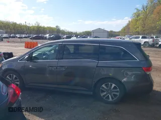 2015 Honda Odyssey Touring Elite with VIN 5FNRL5H99FB094727, listed as a IAAI auction lot 42001288 with 254,015 mi miles and . Bid and sale history available at DreamBid. Image 15.