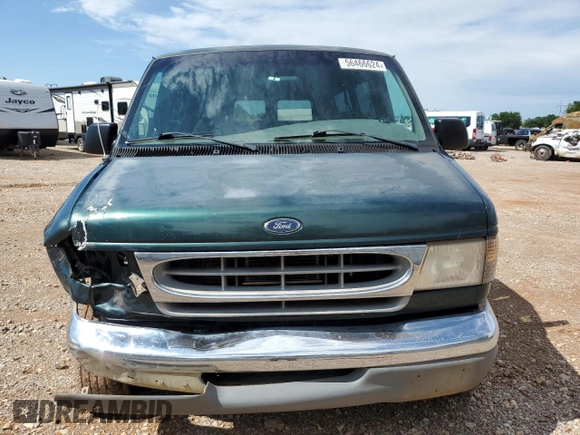 2000 Ford Econoline Passenger XL with VIN 1FBSS31L5YHA98957, listed as a Copart auction lot 56466624 with 102,350 mi miles and Salvage Title. Bid and sale history available at DreamBid. Image 5.