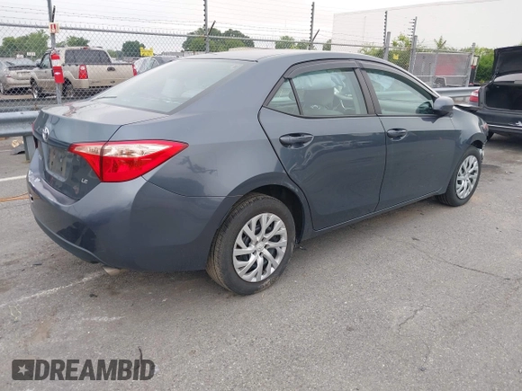 2018 Toyota Corolla L with VIN 2T1BURHE1JC007046, listed as a IAAI auction lot 42417100 with 69,845 mi miles and . Bid and sale history available at DreamBid. Image 4.