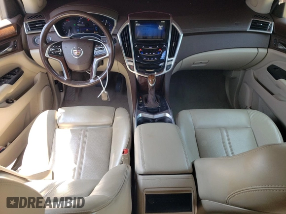 2015 Cadillac SRX Luxury Collection z VIN 3GYFNBE35FS534651, wystawiony jako Copart lot #59124955 z przebiegiem Nie podano mil oraz Szkoda całkowita • Salvage title. Historia ofert i sprzedaży dostępna na DreamBid. Obrazek 8.