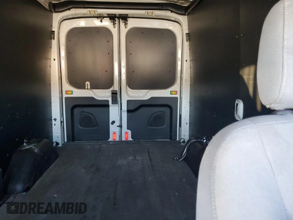 2018 Ford Transit z VIN 1FTYR1CG6JKA51628, wystawiony jako Copart lot #81991464 z przebiegiem 189 409 mil mil oraz Szkoda całkowita • Salvage title. Historia ofert i sprzedaży dostępna na DreamBid. Obrazek 10.
