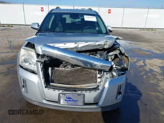 2013 GMC Terrain SLE z VIN 2GKALSEK9D6120964, wystawiony jako IAAI lot #41880269 z przebiegiem 169 579 mil mil oraz . Historia ofert i sprzedaży dostępna na DreamBid. Obrazek 6.