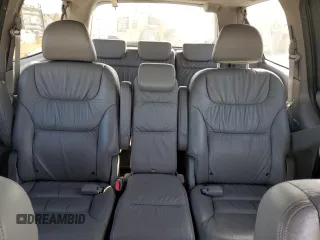2009 Honda Odyssey EX-L with VIN 5FNRL38799B034292, listed as a Copart auction lot 52547205 with 116,658 mi miles and Salvage Title. Bid and sale history available at DreamBid. Image 10.