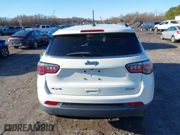 2020 Jeep Compass Latitude with VIN 3C4NJDBB2LT115599, listed as a IAAI auction lot 40970548 with 63,349 mi miles. Bid and sale history available at carsss.com. Image 16.