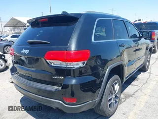 2018 Jeep Grand Cherokee Laredo E z VIN 1C4RJEAG9JC131344, wystawiony jako IAAI lot #42218060 z przebiegiem 126 639 mil mil oraz . Historia ofert i sprzedaży dostępna na DreamBid. Obrazek 4.