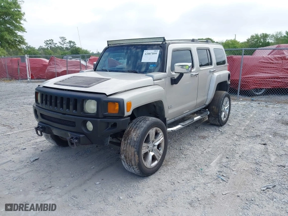 2006 Hummer H3 with VIN 5GTDN136068312962, listed as a IAAI auction lot 42087899 with 298,681 mi miles. Bid and sale history available at carsss.com. Image 2.