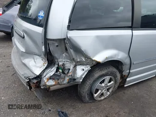 2009 Dodge Grand Caravan SXT z VIN 2D8HN54139R615585, wystawiony jako IAAI lot #42334638 z przebiegiem 129 672 mil mil oraz . Historia ofert i sprzedaży dostępna na DreamBid. Obrazek 6.