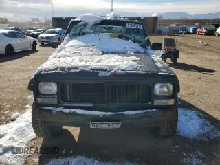 1990 Jeep Cherokee z VIN 1J4FJ28L1LL100736, wystawiony jako Copart lot #81339574 z przebiegiem 160 363 mil mil oraz Czysty tytuł • Clean title. Historia ofert i sprzedaży dostępna na DreamBid. Obrazek 5.