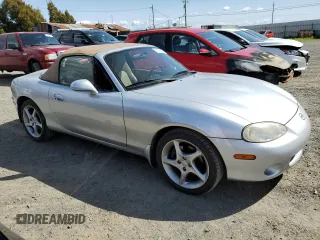 2001 Mazda MX-5 Miata with VIN JM1NB353810204843, listed as a Copart auction lot 51855565 with 147,012 mi miles and Salvage Title. Bid and sale history available at DreamBid. Image 4.