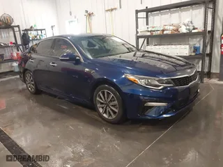 2019 Kia Optima EX with VIN 5XXGU4L19KG285328, listed as a IAAI auction lot 41653327 with 114,251 mi miles. Bid and sale history available at carsss.com. Image 1.