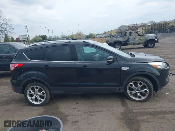2013 Ford Escape Titanium с VIN 1FMCU9J9XDUC53579, выставлен на аукционе IAAI как лот 42166603 с пробегом 112 736 миль миль и . История ставок и продаж доступна на DreamBid. Изображение 13.