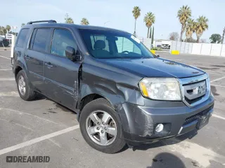 2011 Honda Pilot EX with VIN 5FNYF4H46BB003568, listed as a IAAI auction lot 41762208 with 147,801 mi miles. Bid and sale history available at carsss.com. Image 1.