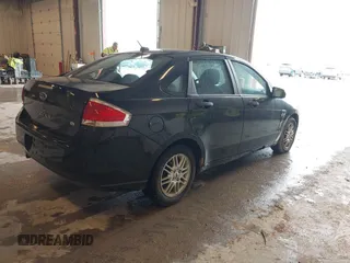 2009 Ford Focus SE with VIN 1FAHP35N69W128084, listed as a IAAI auction lot 42202678 with 290,358 mi miles. Bid and sale history available at carsss.com. Image 4.