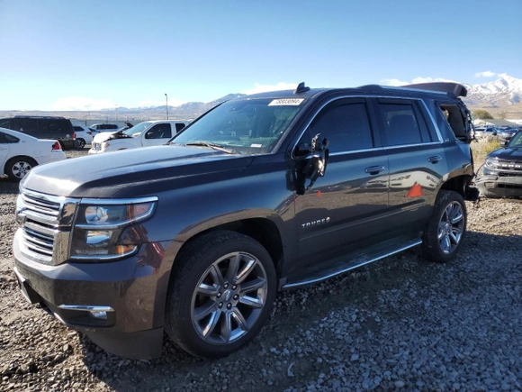 2015 Chevrolet Tahoe LTZ with VIN 1GNSKCKC4FR704080, listed as a Copart auction lot 78803094 with 156,992 mi miles and Salvage Title. Bid and sale history available at carsss.com. Image 1.