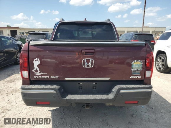 2019 Honda Ridgeline RTL-E with VIN 5FPYK3F71KB002046, listed as a Copart auction lot 61934455 with 131,674 mi miles and Salvage title. Bid and sale history available at DreamBid. Image 6.
