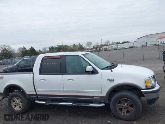 2003 Ford F-150 XLT with VIN 1FTRW08L43KA64328, listed as a IAAI auction lot 41932751 with 275,213 mi miles. Bid and sale history available at carsss.com. Image 13.