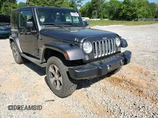 2017 Jeep Wrangler Sahara z VIN 1C4AJWBG1HL669600, wystawiony jako Copart lot #52856865 z przebiegiem 85 311 mil mil oraz Szkoda całkowita • Salvage title. Historia ofert i sprzedaży dostępna na DreamBid. Obrazek 11.