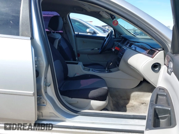 2014 Chevrolet Impala LS with VIN 2G1WA5E38E1121693, listed as a IAAI auction lot 41814213 with 129,255 mi miles and . Bid and sale history available at DreamBid. Image 5.