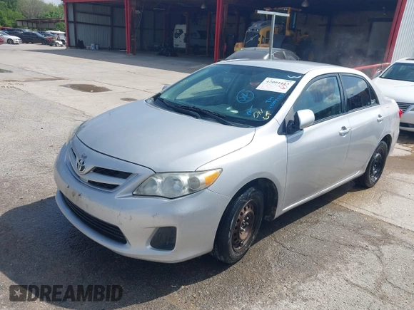 2012 Toyota Corolla L with VIN 2T1BU4EE1CC773885, listed as a IAAI auction lot 42004443 with 192,607 mi miles. Bid and sale history available at carsss.com. Image 6.