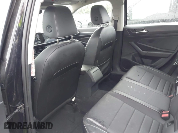 2023 Volkswagen Jetta SE with VIN 3VW7M7BUXPM038075, listed as a IAAI auction lot 42314234 with 19,490 mi miles and . Bid and sale history available at DreamBid. Image 8.