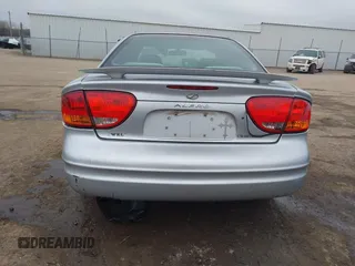 2003 Oldsmobile Alero GL1 z VIN 1G3NL52F43C169291, wystawiony jako IAAI lot #41546681 z przebiegiem 176 341 mil mil oraz . Historia ofert i sprzedaży dostępna na DreamBid. Obrazek 17.