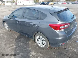 2020 Subaru Impreza with VIN 4S3GTAA66L1714762, listed as a IAAI auction lot 41154150 with 63,009 mi miles. Bid and sale history available at carsss.com. Image 3.