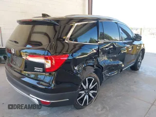 2021 Honda Pilot Touring 8-Passenger z VIN 5FNYF6H99MB049728, wystawiony jako IAAI lot #42194602 z przebiegiem 41 374 mil mil oraz . Historia ofert i sprzedaży dostępna na DreamBid. Obrazek 4.
