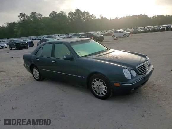 2000 Mercedes-Benz E-Class with VIN WDBJF65J1YB103093, listed as a Copart auction lot 51587325 with 208,350 mi miles and Salvage Title. Bid and sale history available at carsss.com. Image 10.