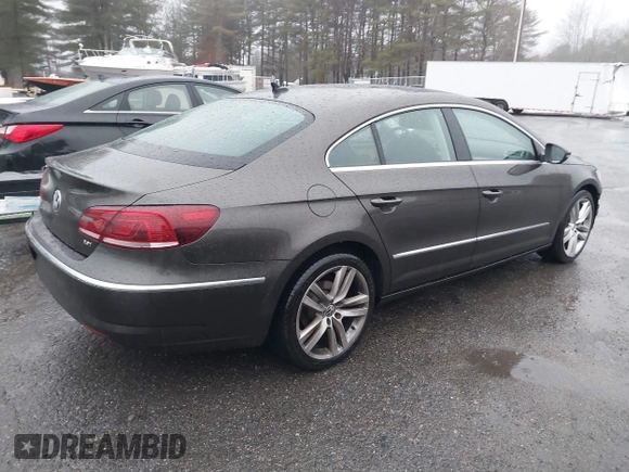 2013 Volkswagen CC Lux with VIN WVWRP7AN5DE554388, listed as a IAAI auction lot 41004116 with 162,457 mi miles. Bid and sale history available at carsss.com. Image 4.