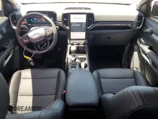 2025 Ford Ranger Lariat with VIN 1FTER4KH9SLE17446, listed as a Copart auction lot 61853775 with 1,810 mi miles and Salvage title. Bid and sale history available at DreamBid. Image 8.