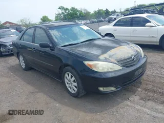 2003 Toyota Camry LE with VIN 4T1BE30K33U243758, listed as a IAAI auction lot 42169032 with 260,336 mi miles and . Bid and sale history available at DreamBid. Image 1.